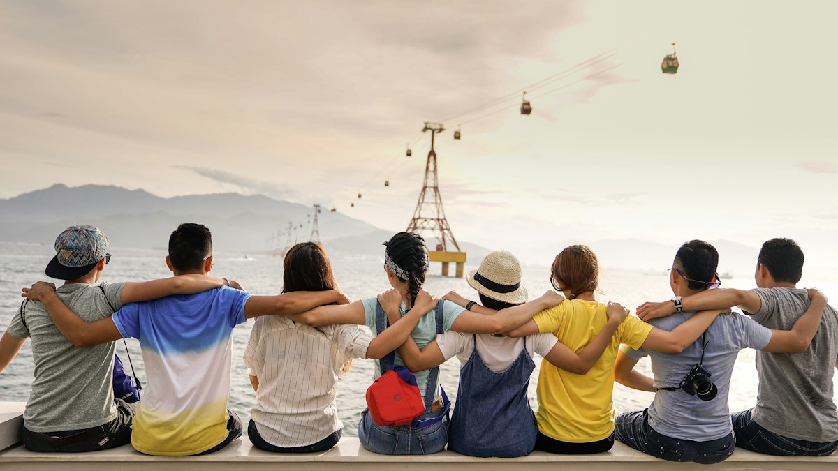 Diverse community holding hands for a fair world